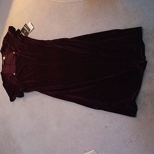 Burgundy stretch velvet middie dress w/ square neckline and rhinestone trim.